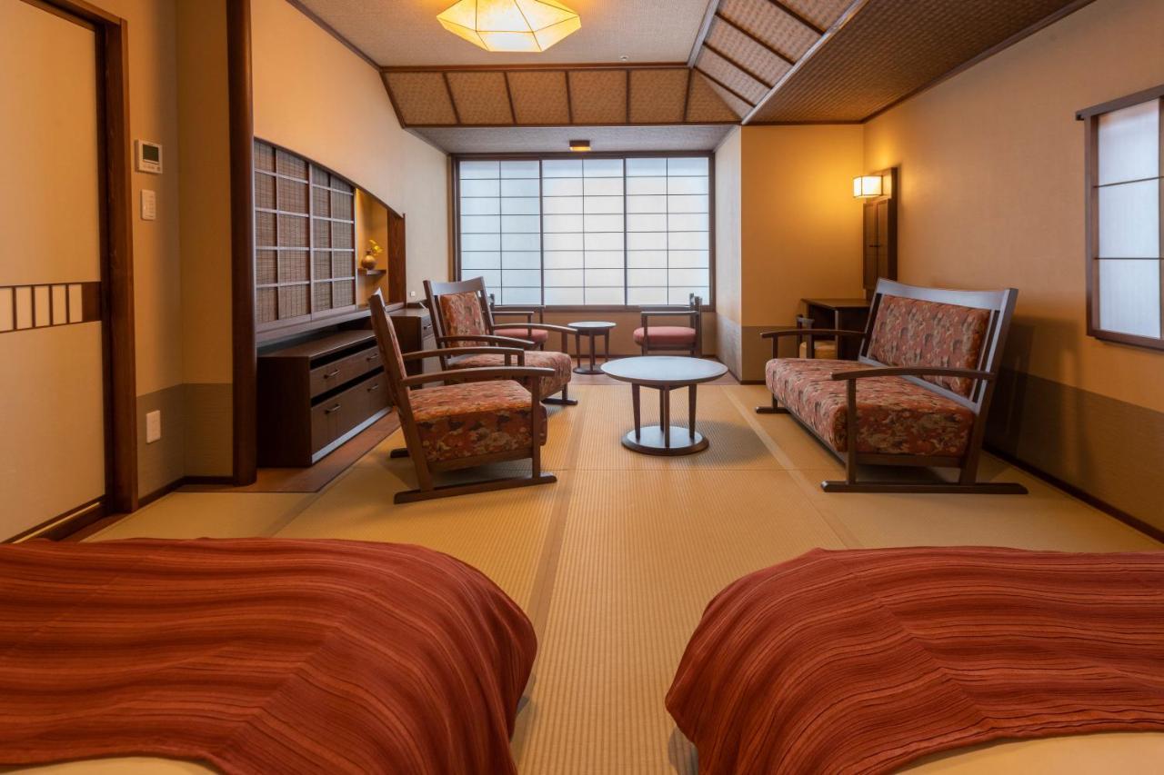 Отель Jozankei Onsen Yurakusoan Саппоро Экстерьер фото