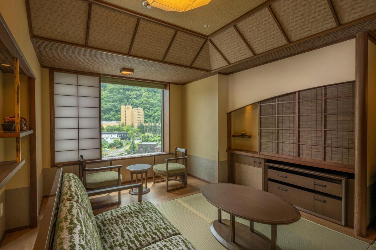 Отель Jozankei Onsen Yurakusoan Саппоро Экстерьер фото