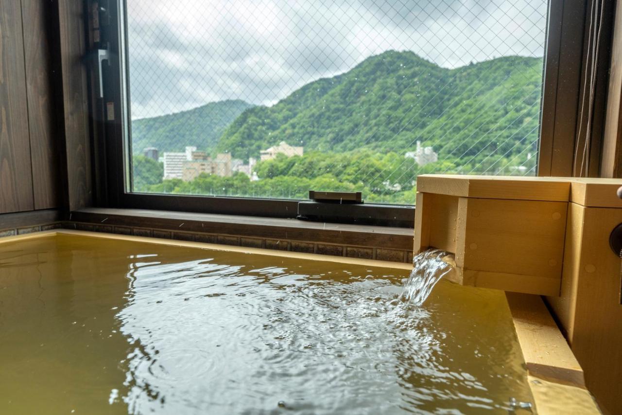 Отель Jozankei Onsen Yurakusoan Саппоро Экстерьер фото