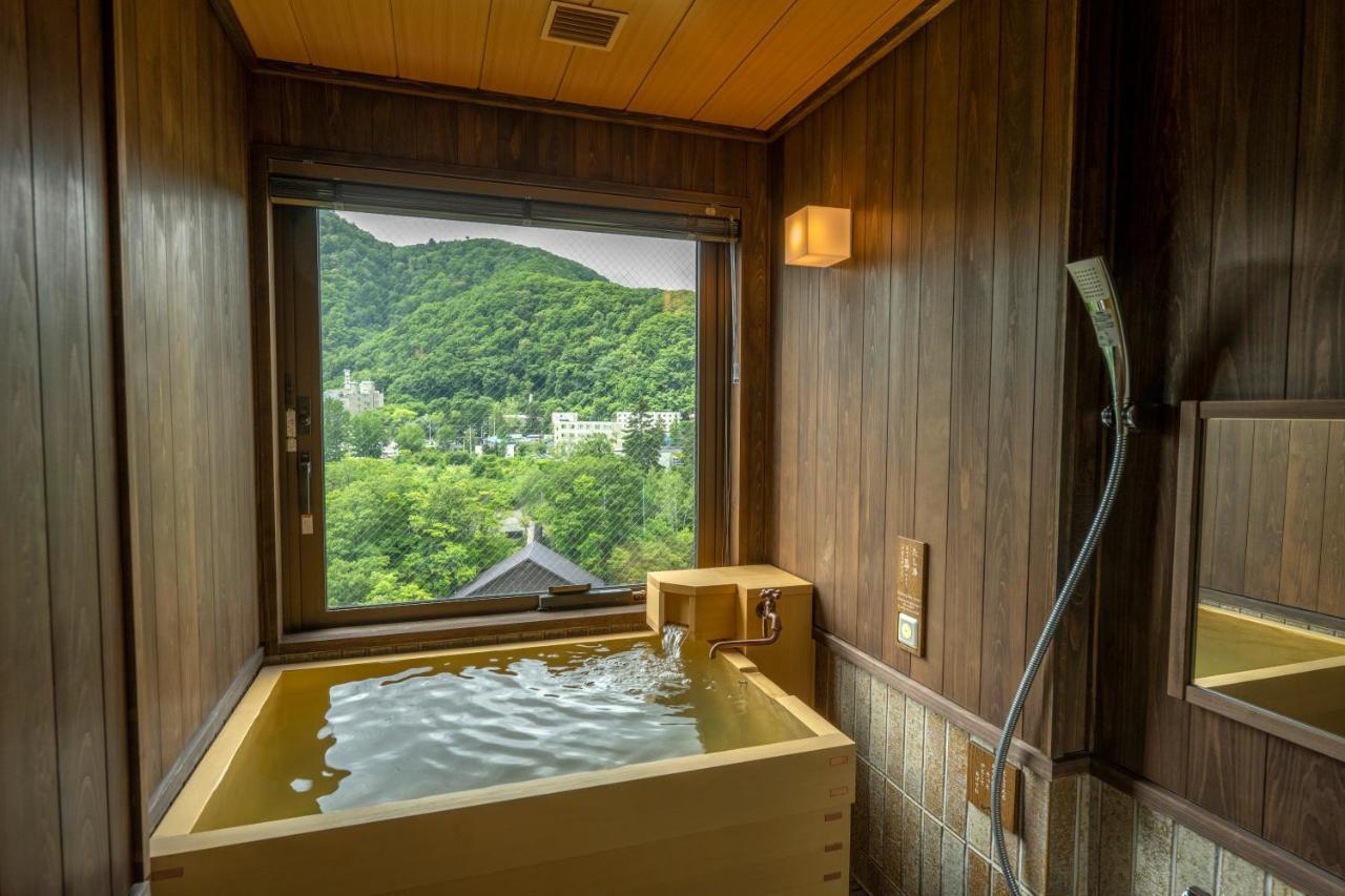 Отель Jozankei Onsen Yurakusoan Саппоро Экстерьер фото