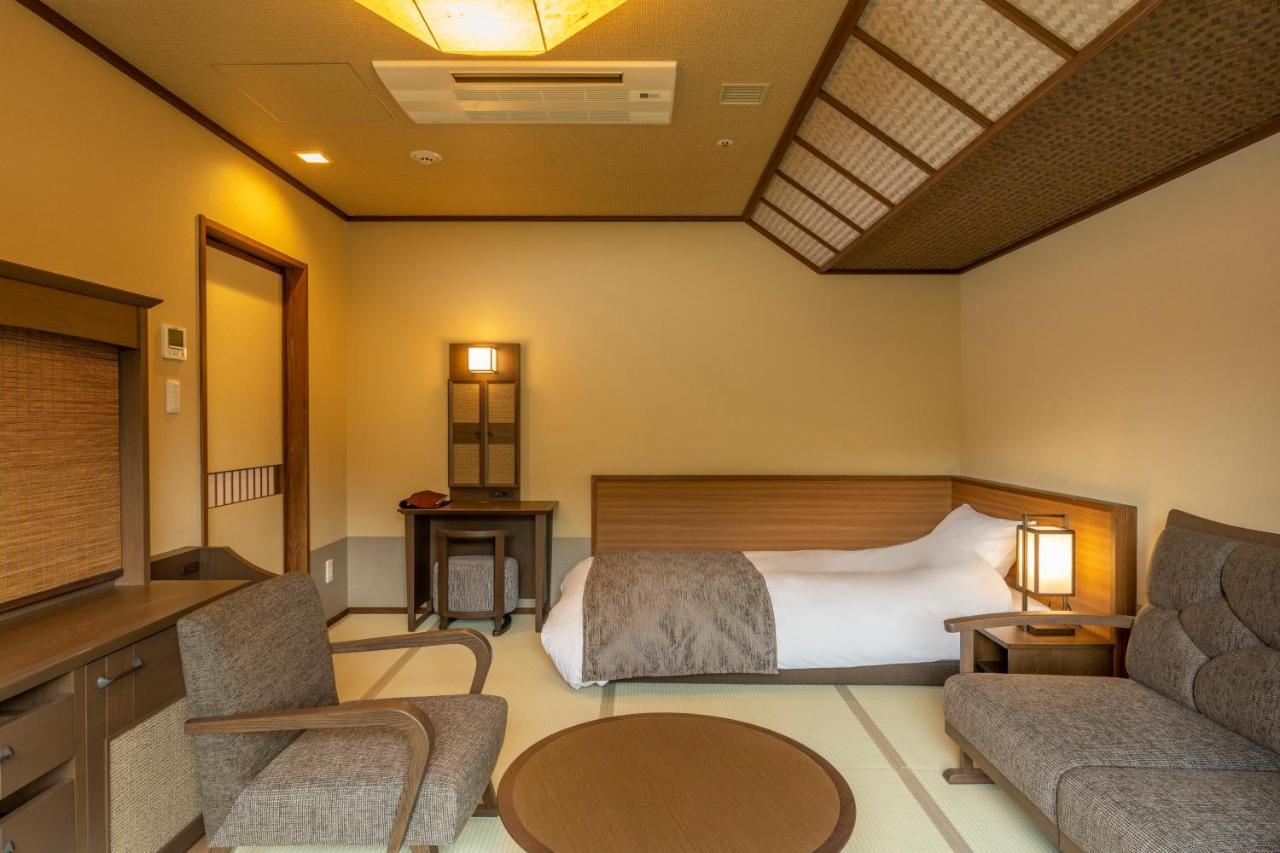 Отель Jozankei Onsen Yurakusoan Саппоро Экстерьер фото